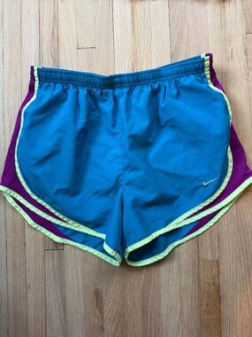 Nike Women's Teal Running Shorts with Purple Panels & Neon Yellow Trim